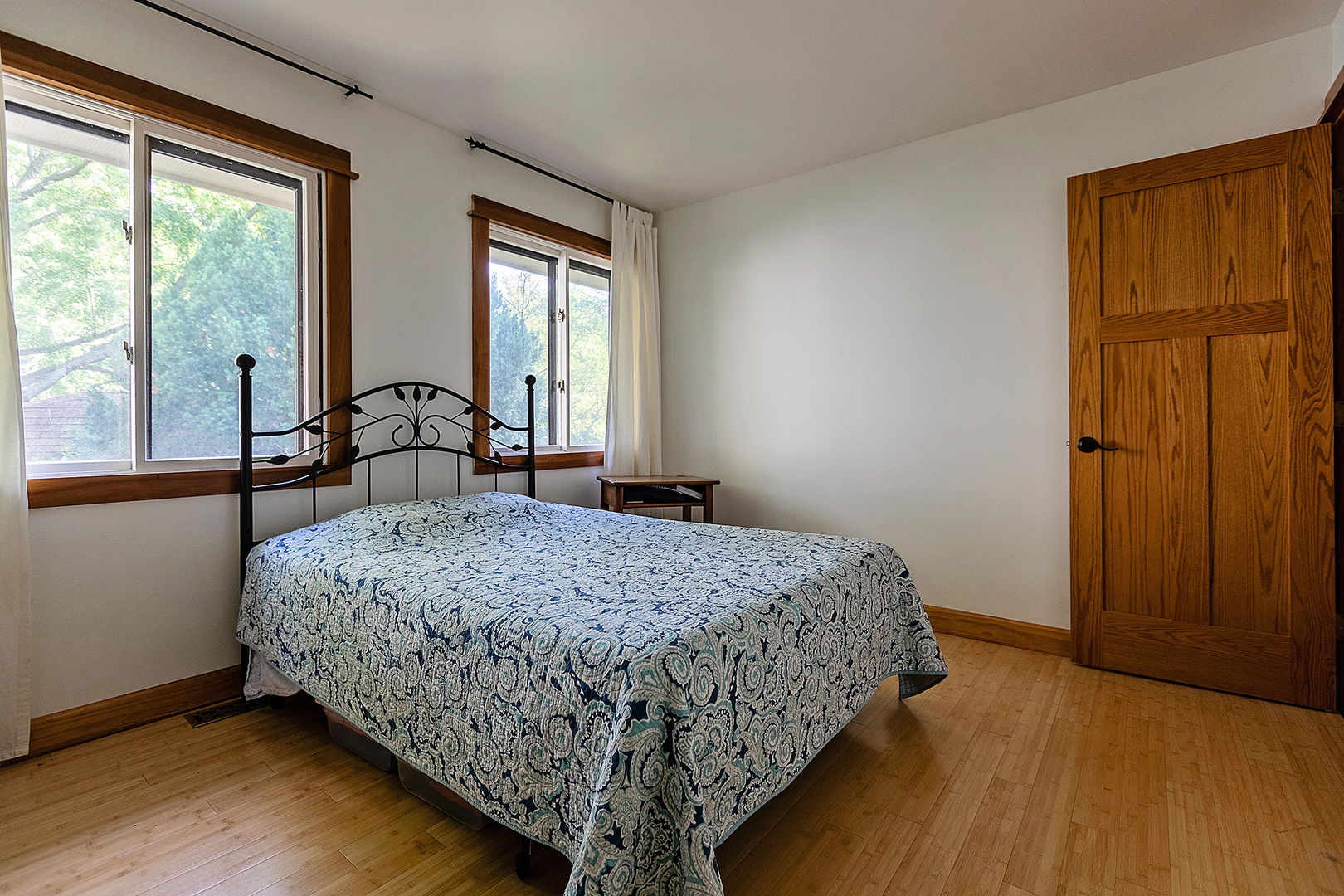 304 Warwick Drive Naperville, IL 60565 - Photo 24 of 41 a bedroom with a bed and large windows