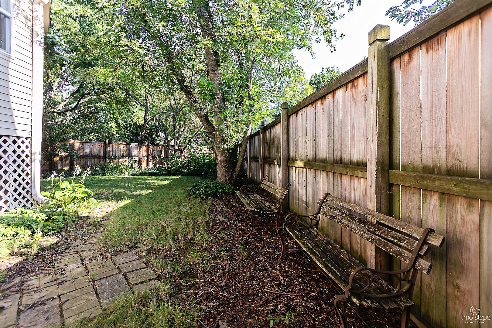 304 Warwick Drive Naperville, IL 60565 - Photo 35 of 41 a view of a backyard with pathway