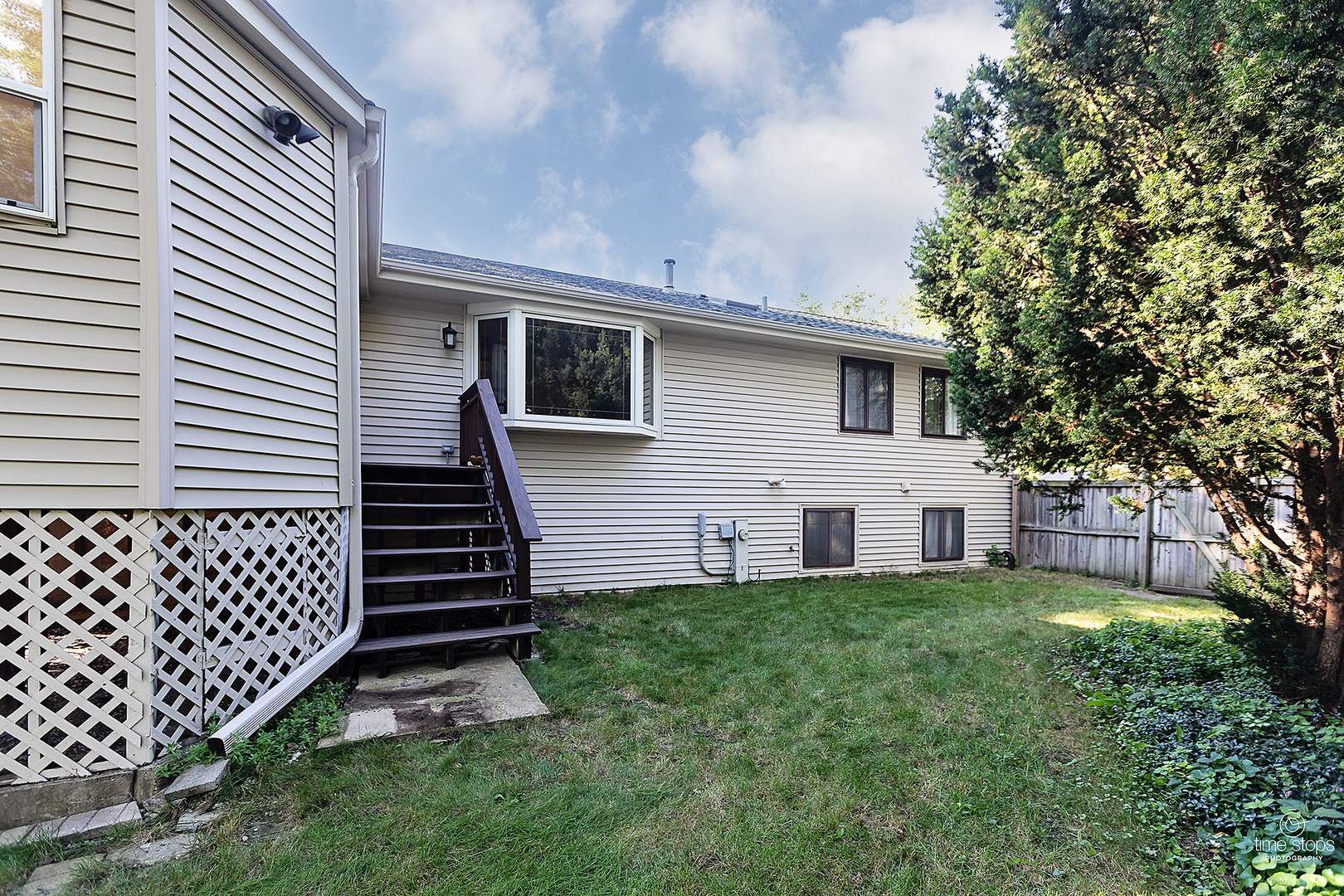 304 Warwick Drive Naperville, IL 60565 - Photo 38 of 41 a view of a house with a yard