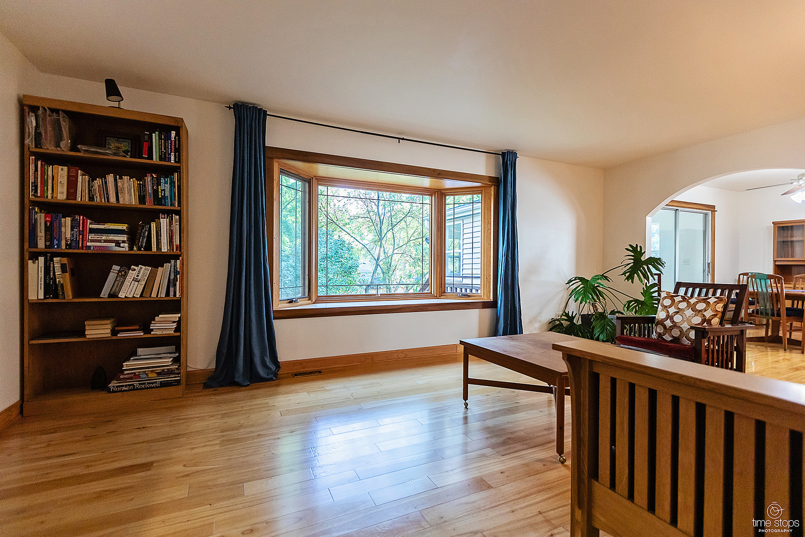 304 Warwick Drive Naperville, IL 60565 - Photo 4 of 41 a room with furniture and book shelf