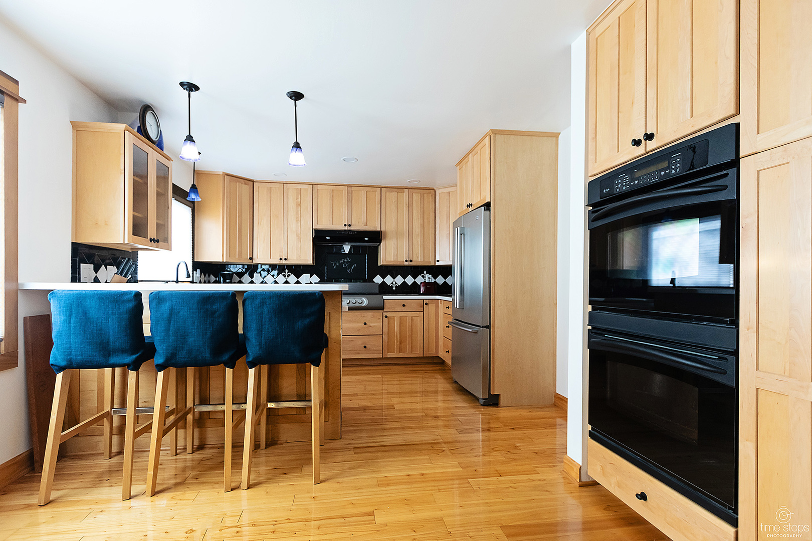 304 Warwick Drive Naperville, IL 60565 - Photo 9 of 41 a kitchen with granite countertop a refrigerator stove top oven and sink