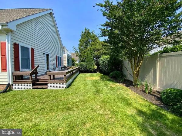 a house with swimming pool in front of it