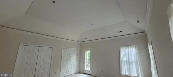 an empty room with an entryway