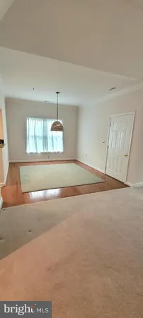 a view of empty room with windows