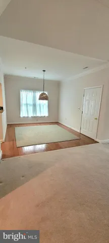 a view of empty room with windows