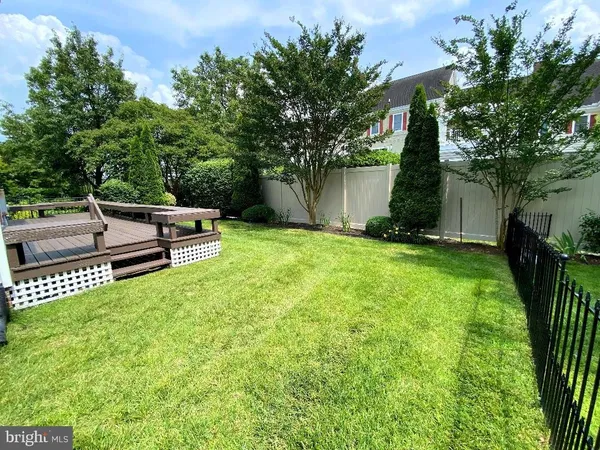 a garden view with a seating space