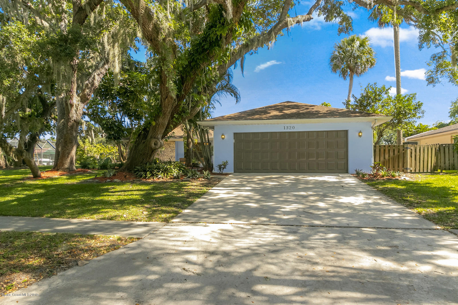 1320 Meadowbrook Road Northeast Palm Bay, FL 32905 - Photo 1 of 34 01_1320MeadowbrookRdNE001_mls