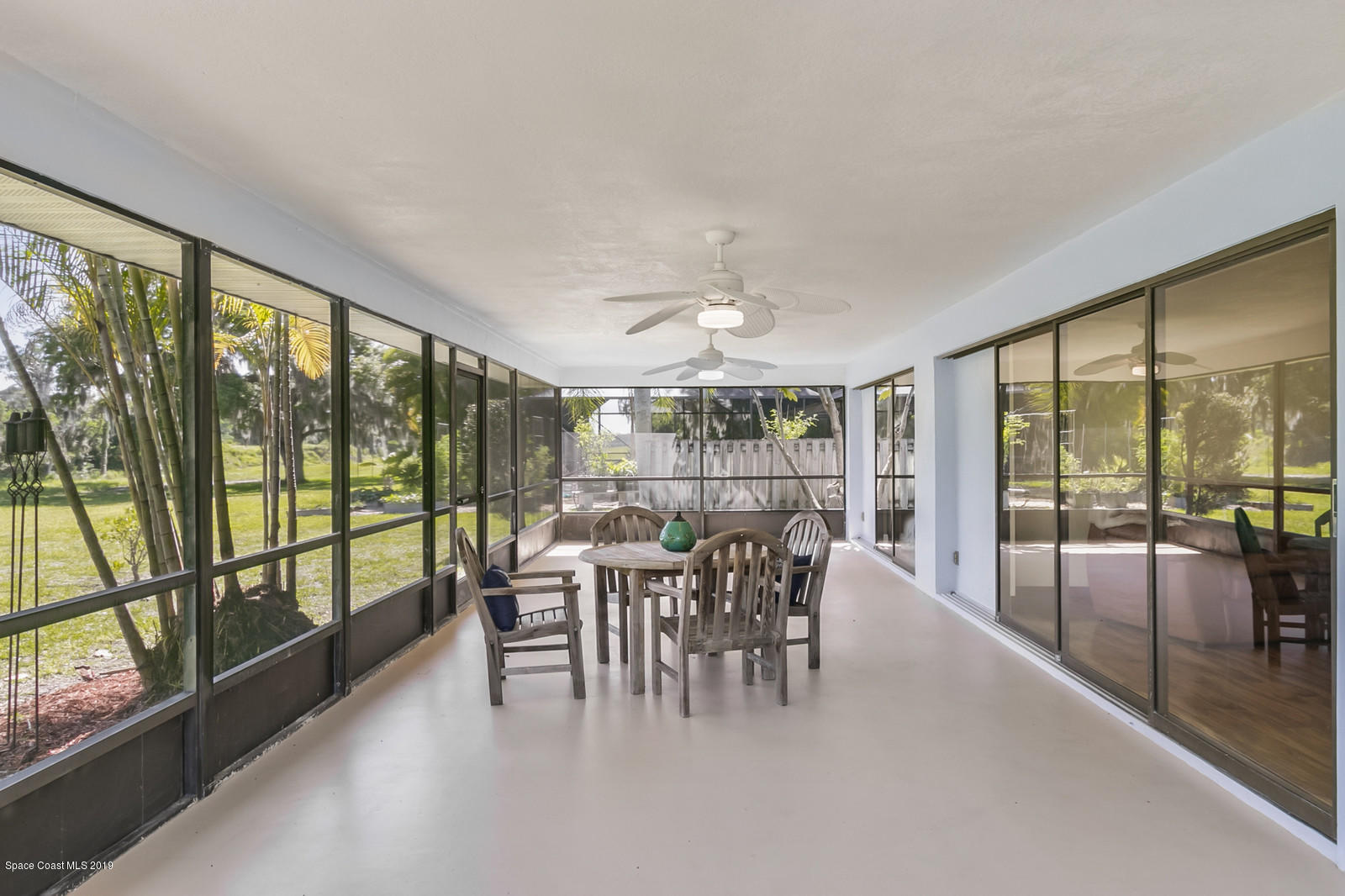 1320 Meadowbrook Road Northeast Palm Bay, FL 32905 - Photo 25 of 34 Screened Porch