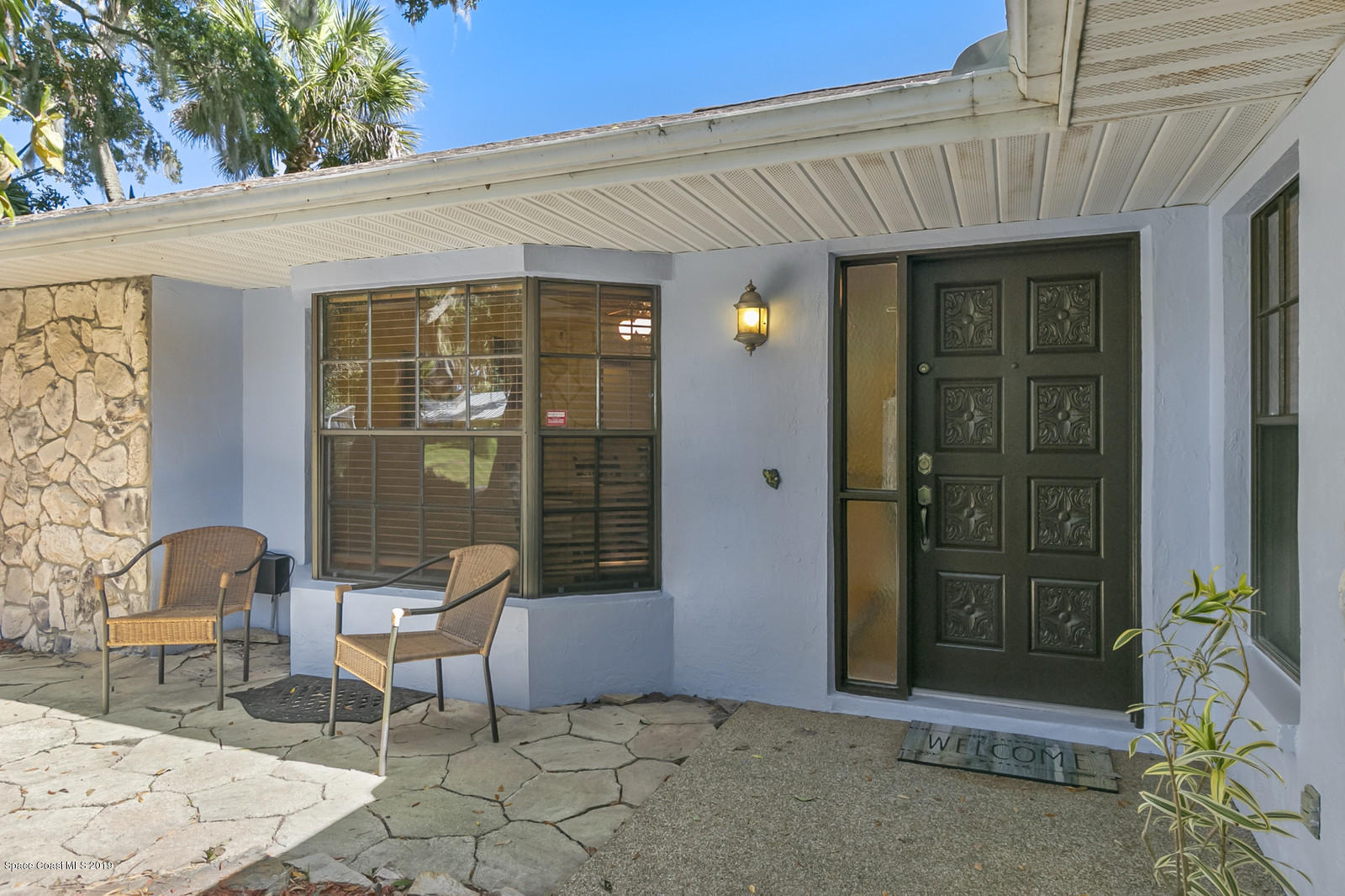 1320 Meadowbrook Road Northeast Palm Bay, FL 32905 - Photo 5 of 34 Inviting Patio
