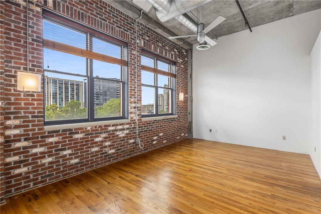 3180 Mathieson Drive Northeast, Unit 1010 Atlanta, GA 30305 - Photo 18 of 44 a view of an empty room with a window