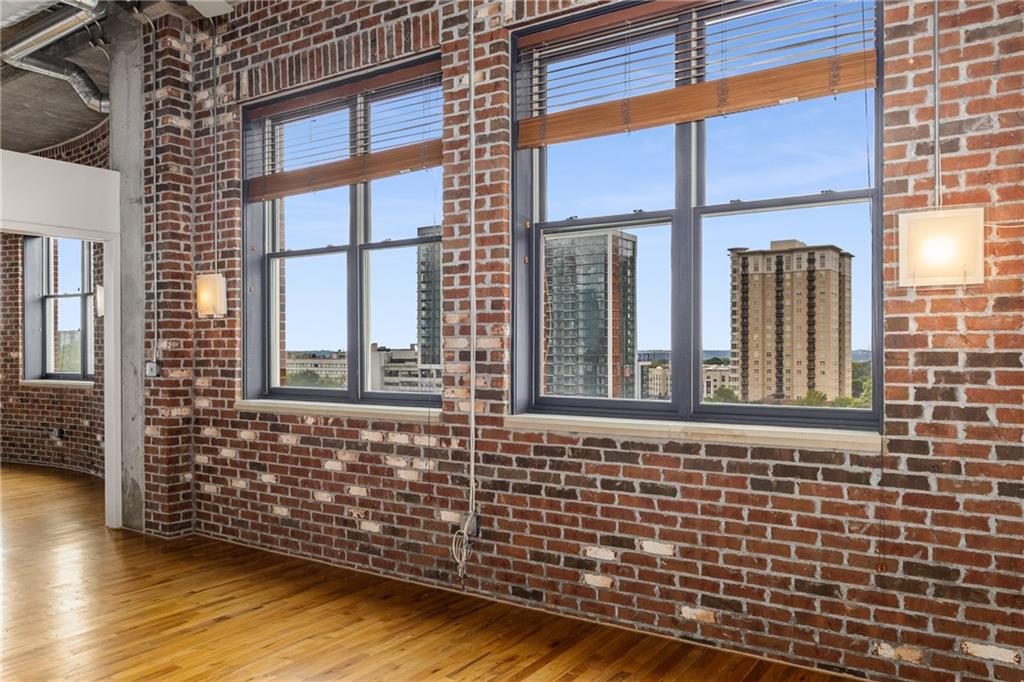 3180 Mathieson Drive Northeast, Unit 1010 Atlanta, GA 30305 - Photo 19 of 44 a view of a brick building with a window