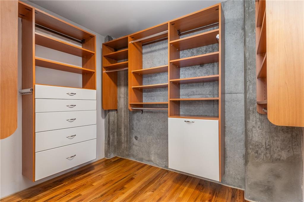 3180 Mathieson Drive Northeast, Unit 1010 Atlanta, GA 30305 - Photo 22 of 44 a view of an empty room with cabinet and a window