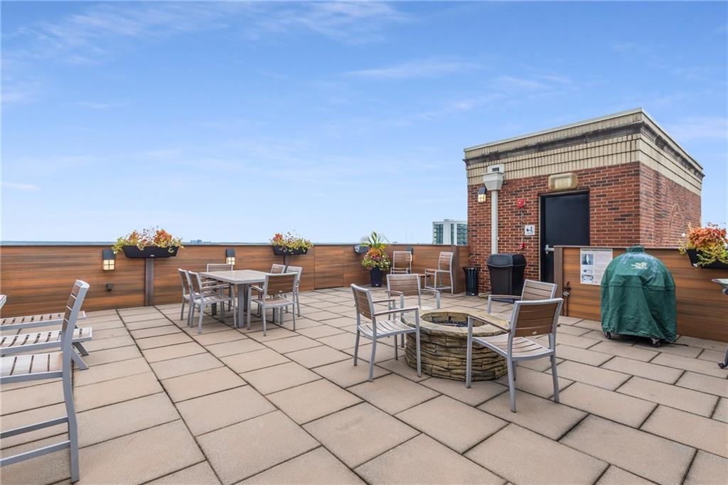 3180 Mathieson Drive Northeast, Unit 1010 Atlanta, GA 30305 - Photo 37 of 44 a view of a terrace with chairs