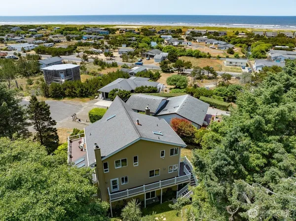 an aerial view of a house with a outdoor space