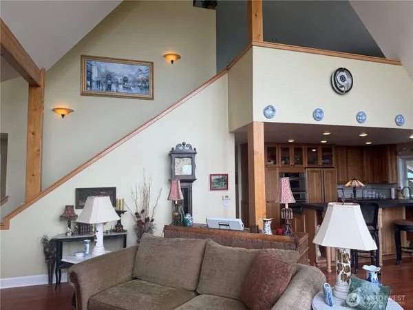 a living room with furniture and a table