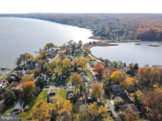 a view of a water with mountains in the background