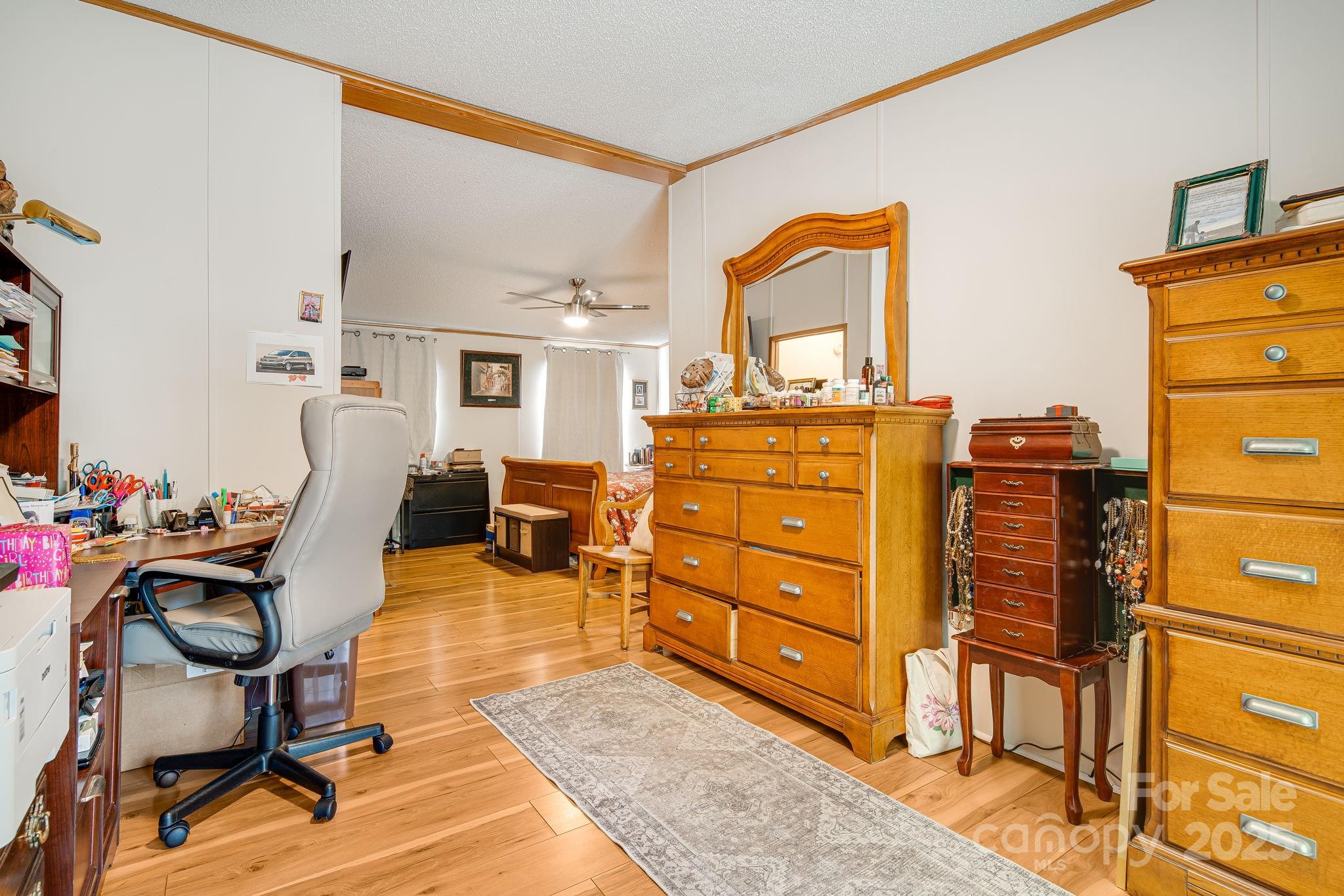 52 Rocky Cove Road Candler, NC 28715 - Photo 11 of 17 a view of a workspace with furniture and a window