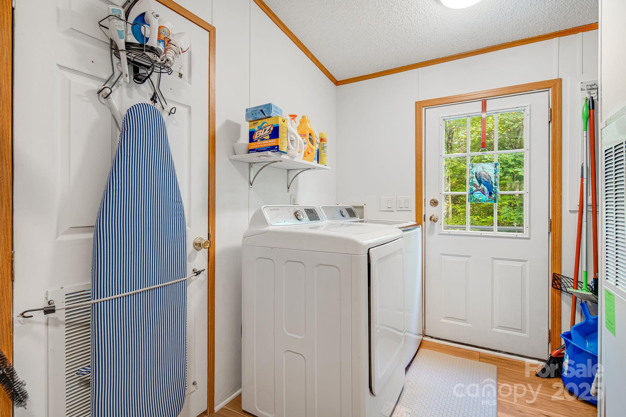 52 Rocky Cove Road Candler, NC 28715 - Photo 15 of 17 a utility room with dryer and washer