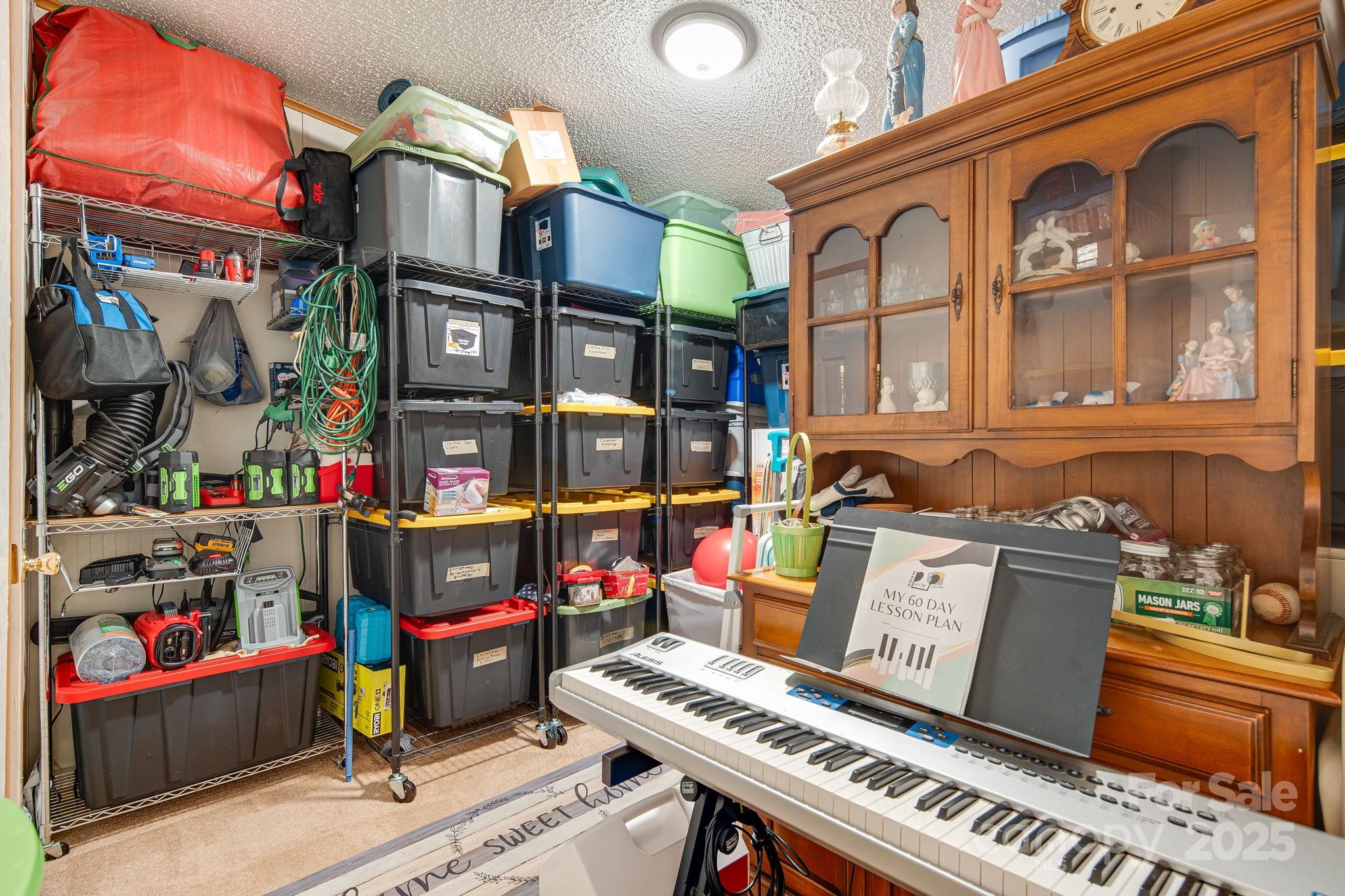 52 Rocky Cove Road Candler, NC 28715 - Photo 16 of 17 a front view of a building with glass windows