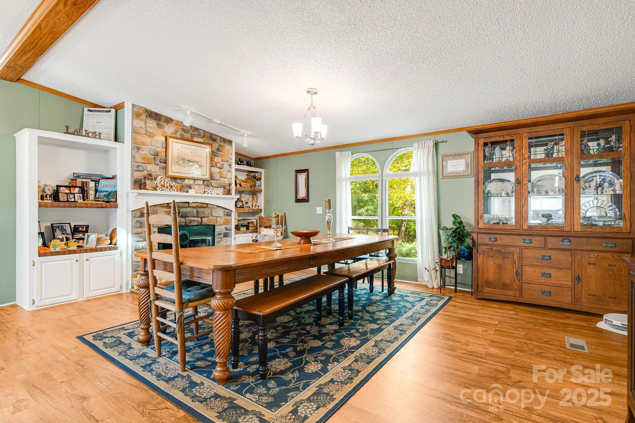 52 Rocky Cove Road Candler, NC 28715 - Photo 4 of 17 a living room with furniture large window and wooden floor
