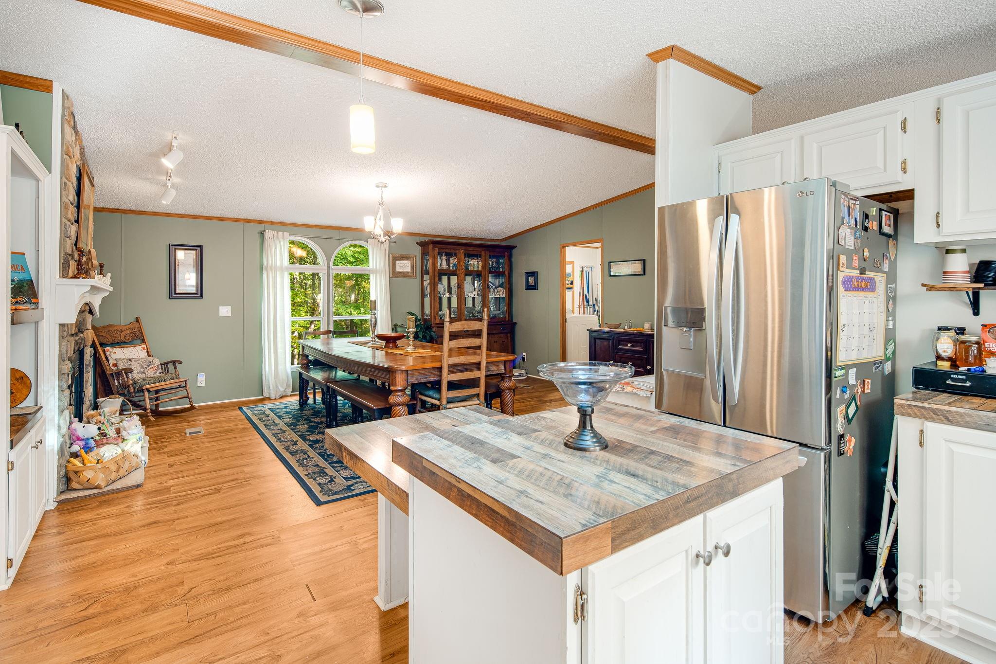 52 Rocky Cove Road Candler, NC 28715 - Photo 7 of 17 a living room with stainless steel appliances granite countertop furniture and a kitchen view