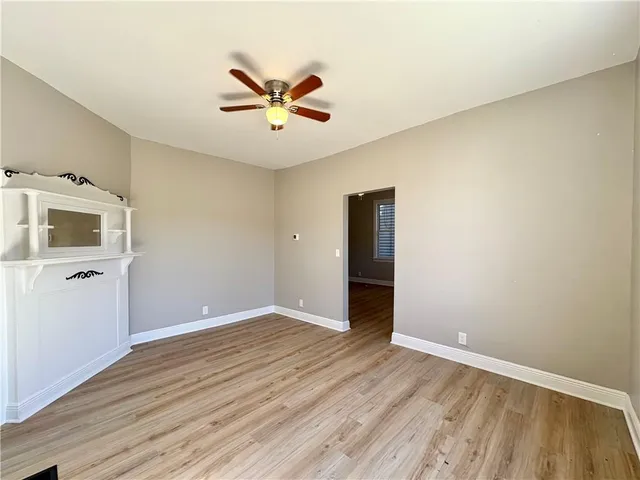 a view of a livingroom with wooden floor