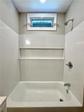 a bathroom with a bathtub