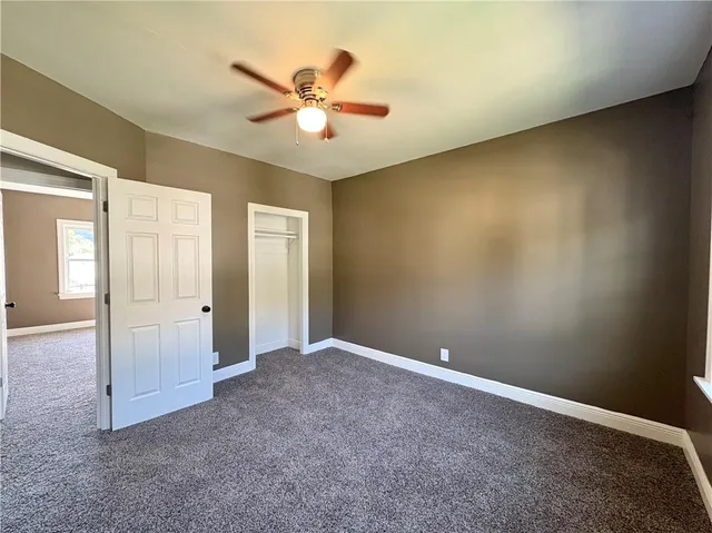 an empty room and window in a room