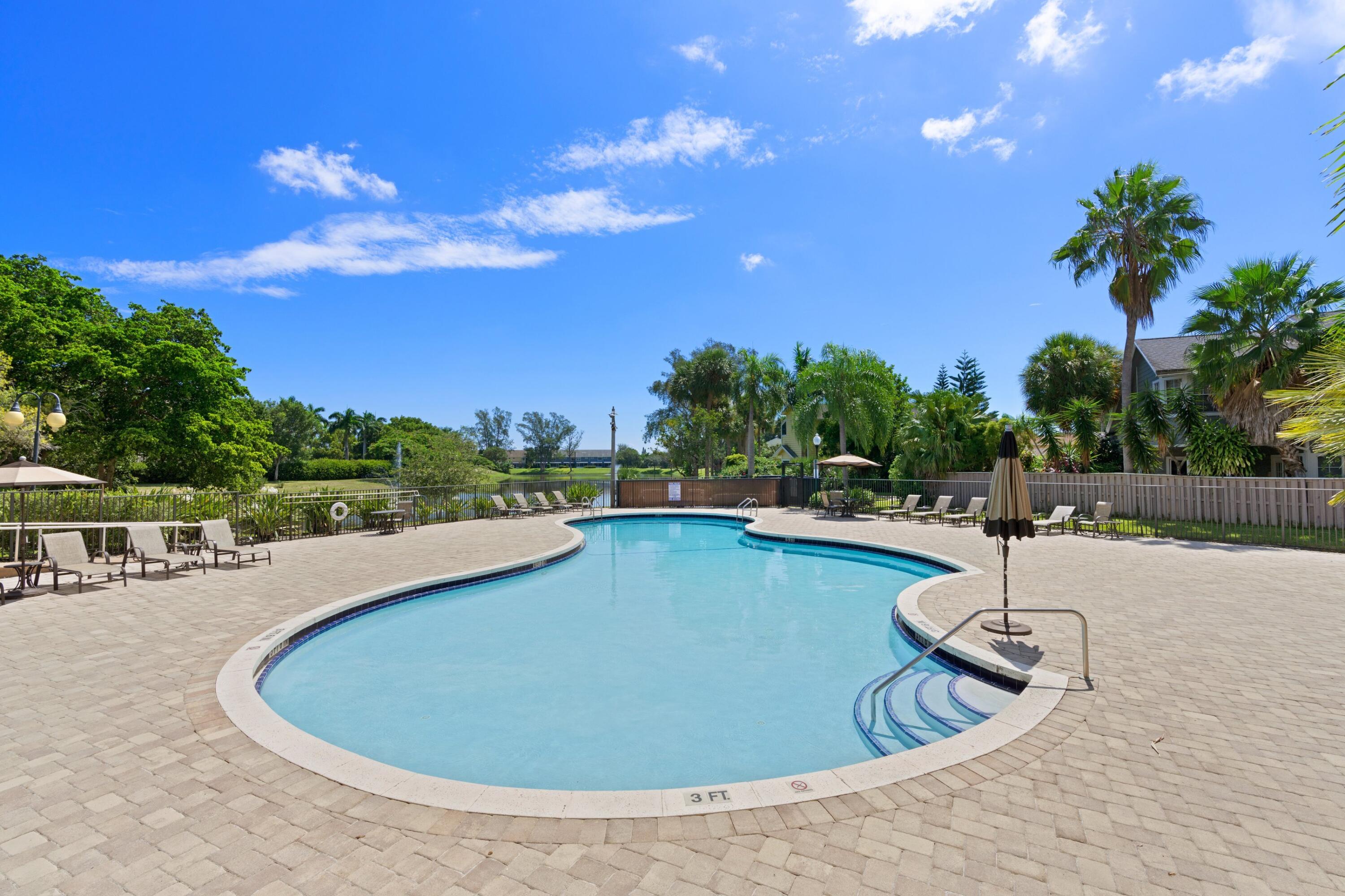 5302 Sapphire Valley Boca Raton, FL 33431 - Photo 13 of 13 a view of a swimming pool with a patio