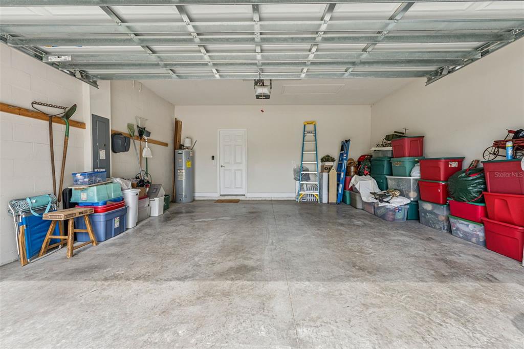 1237 Windy Bay Shoal Tarpon Springs, FL 34689 - Photo 32 of 44 a view of storage and utility room