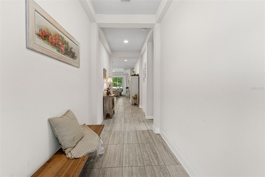 1237 Windy Bay Shoal Tarpon Springs, FL 34689 - Photo 10 of 44 a view of hallway with furniture