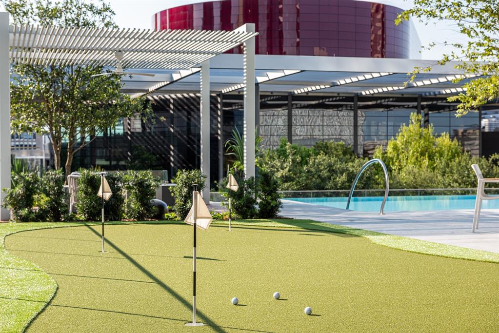 1747 Leonard Street, Unit 2402 Dallas, TX 75201 - Photo 33 of 35 a view of outdoor space and swimming pool