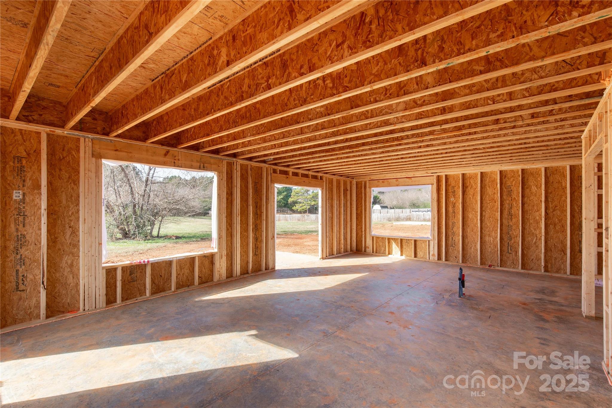 148 Longlea Drive Clover, SC 29710 - Photo 15 of 36 a view of a room with large windows and a swimming pool