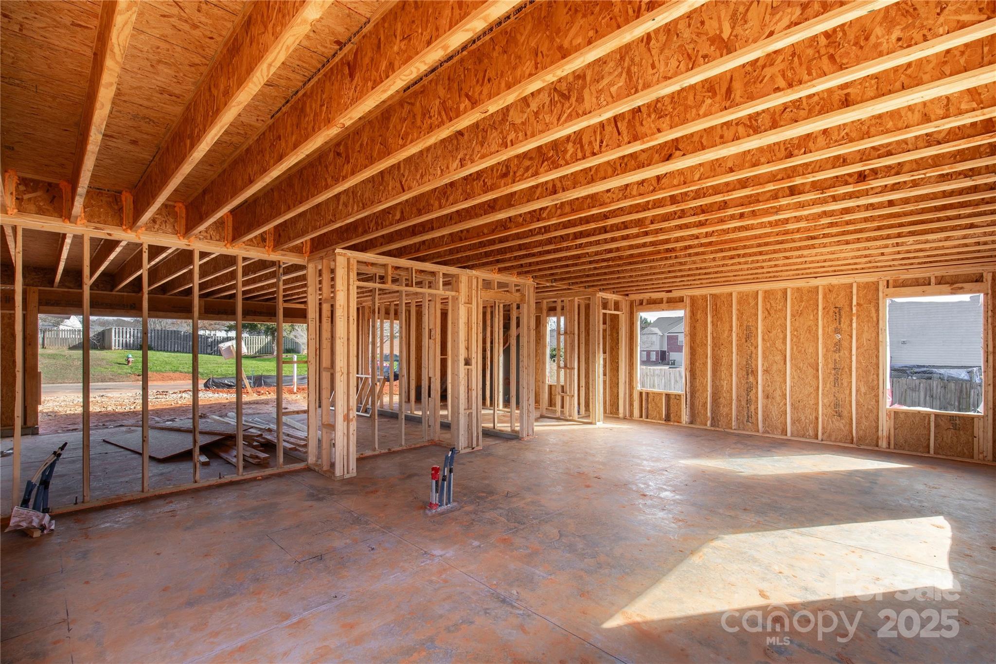 148 Longlea Drive Clover, SC 29710 - Photo 17 of 36 a view of a room with wooden floor and iron stairs