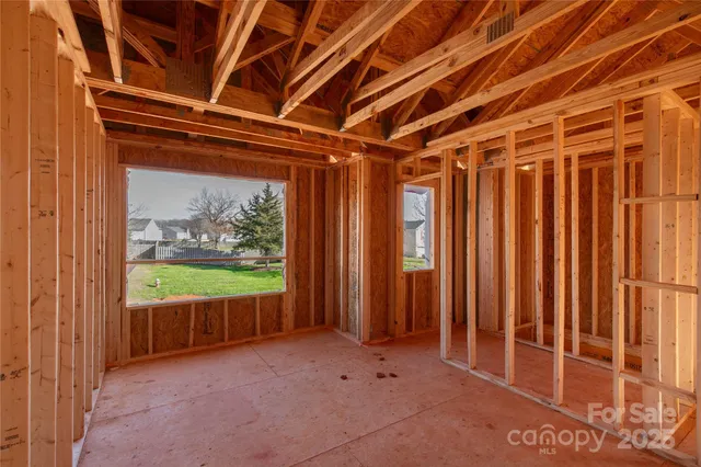 a view of a room with wooden walls