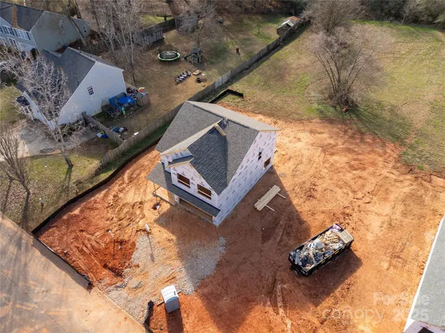 a front view of a house with yard