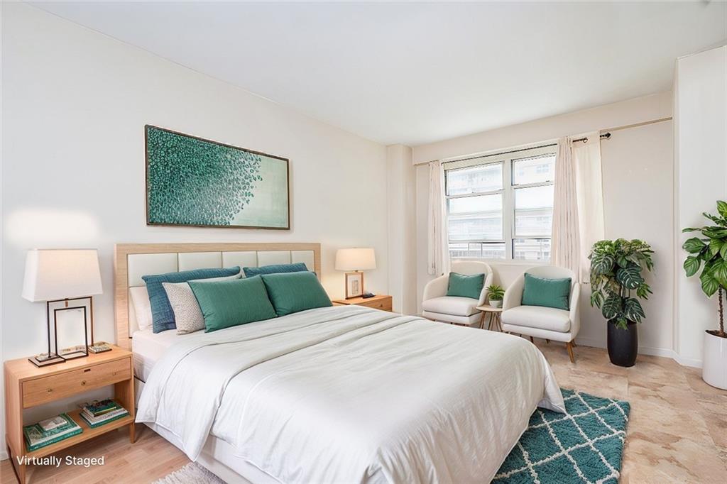 2930 West 5th Street, Unit 5F Brooklyn, NY 11224 - Photo 15 of 20 a bedroom with a large bed and a window