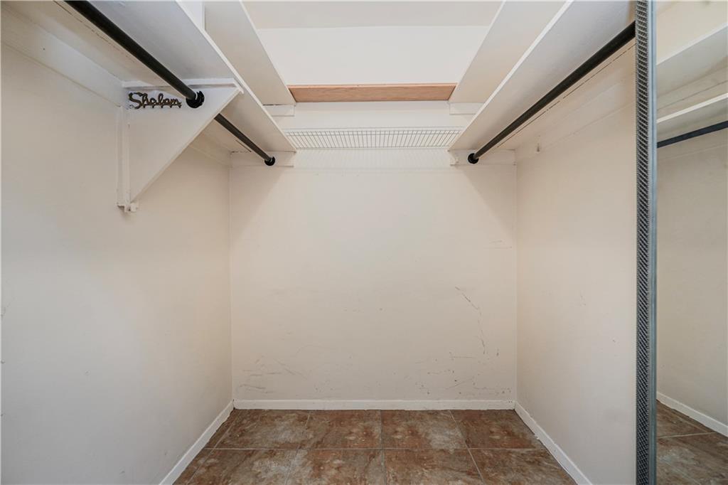 2930 West 5th Street, Unit 5F Brooklyn, NY 11224 - Photo 17 of 20 a view of a room with racks on the wall