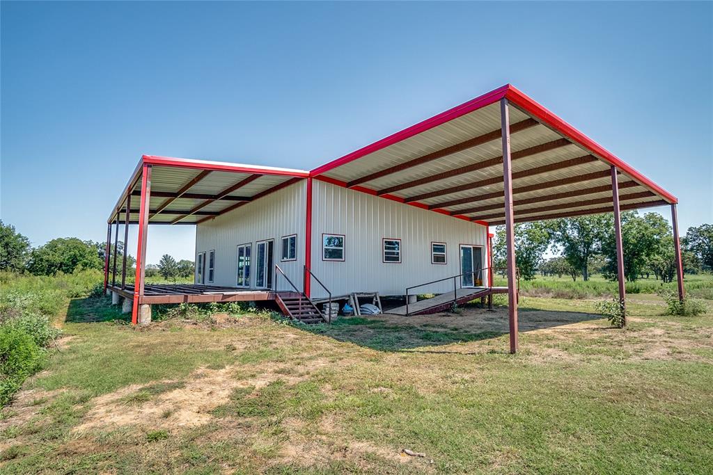 1070 Paradise Oaks Perrin, TX 76486 - Photo 2 of 17 a view of a house with backyard