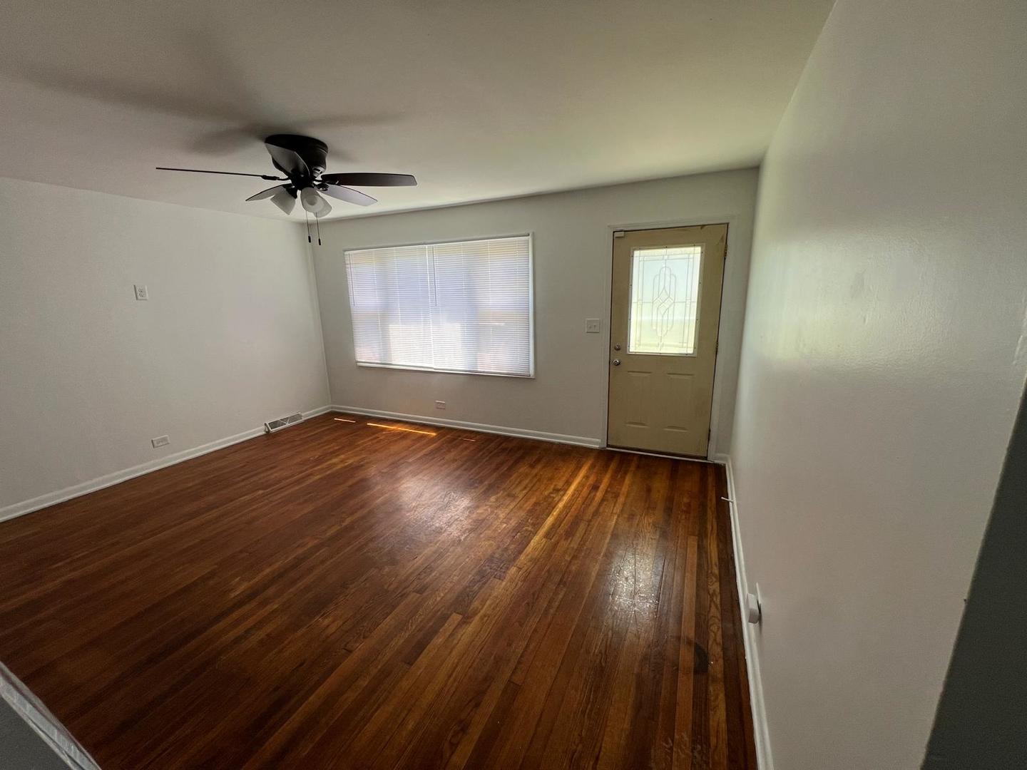 16442 Honore Avenue Markham, IL 60428 - Photo 2 of 16 wooden floor in an empty room