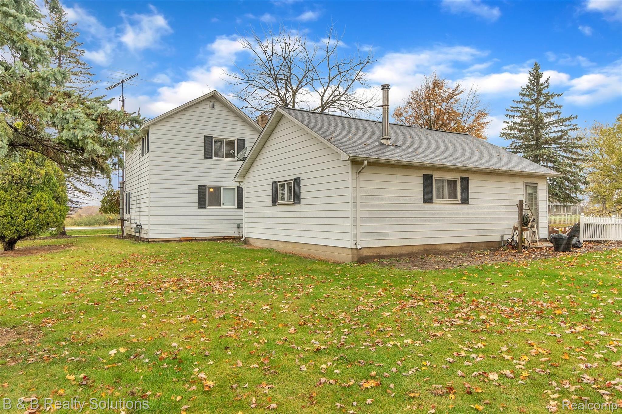 2840 Capac Road Allenton, MI 48002 - Photo 28 of 42 27-2840 Capac Rd,-windowstill-reale.jpg