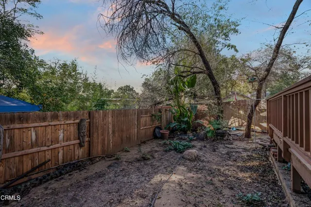 a view of backyard with green space