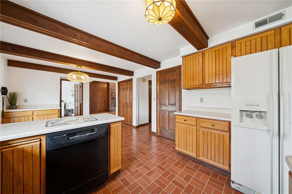 2530 Pleasant Valley Road Murrysville, PA 15668 - Photo 12 of 33 a kitchen with stainless steel appliances granite countertop a stove a sink and a refrigerator