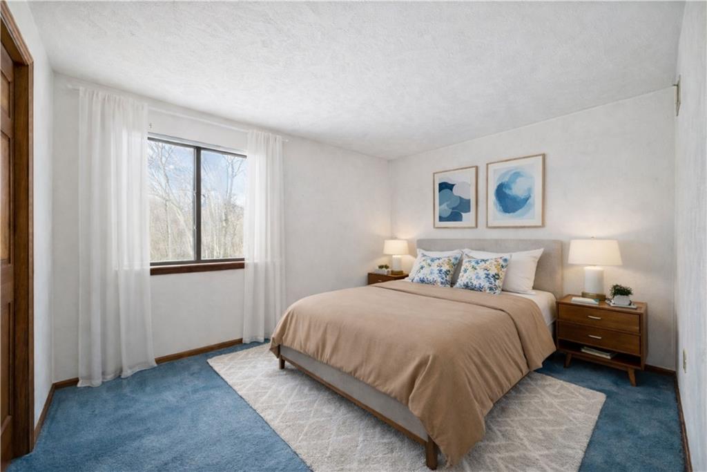 2530 Pleasant Valley Road Murrysville, PA 15668 - Photo 21 of 33 a bedroom with a bed and a window