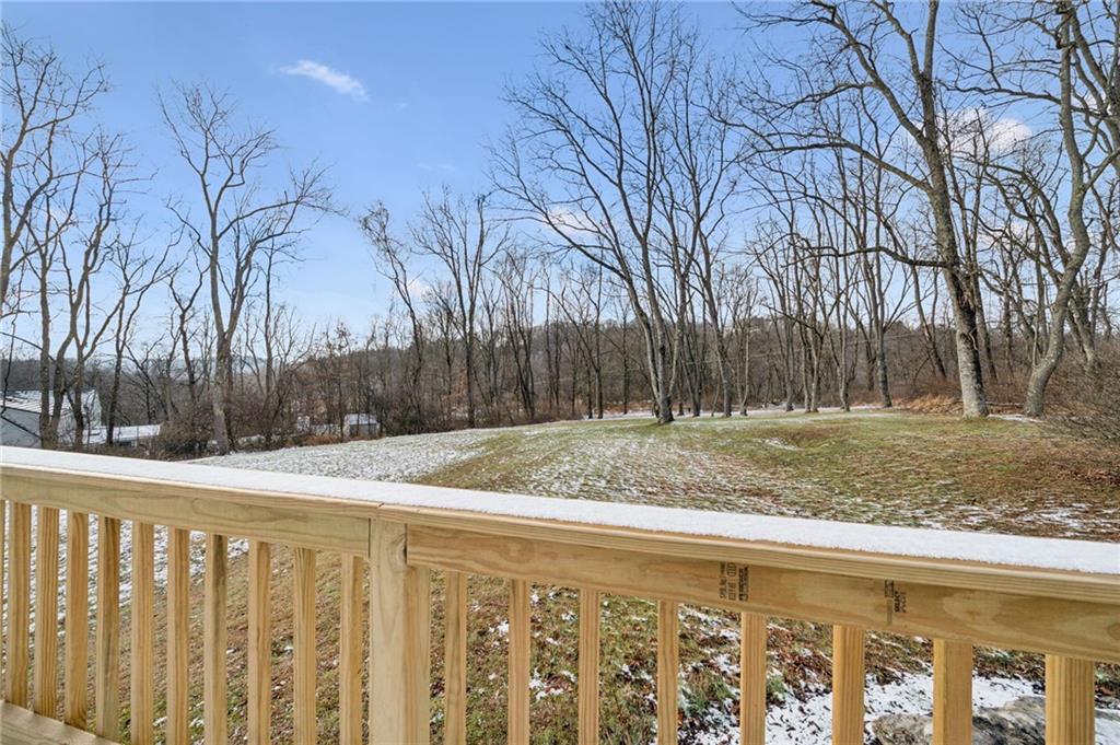 2530 Pleasant Valley Road Murrysville, PA 15668 - Photo 26 of 33 a view of a backyard with wooden fence