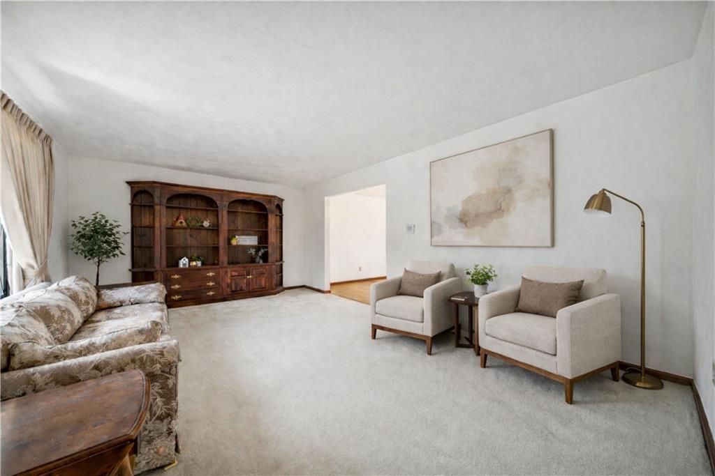 2530 Pleasant Valley Road Murrysville, PA 15668 - Photo 6 of 33 a living room with furniture and a fireplace