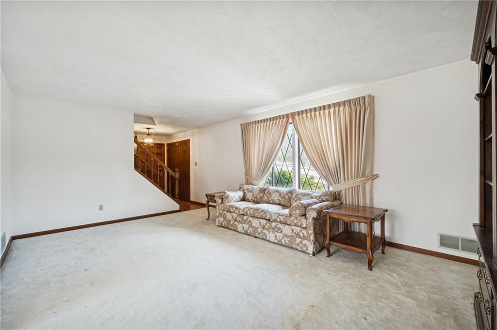 2530 Pleasant Valley Road Murrysville, PA 15668 - Photo 7 of 33 a living room with furniture and a large window