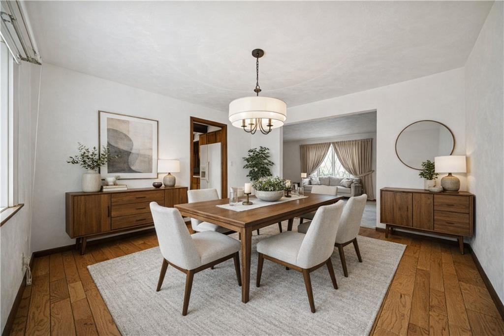 2530 Pleasant Valley Road Murrysville, PA 15668 - Photo 8 of 33 a view of a dining room with furniture window and wooden floor