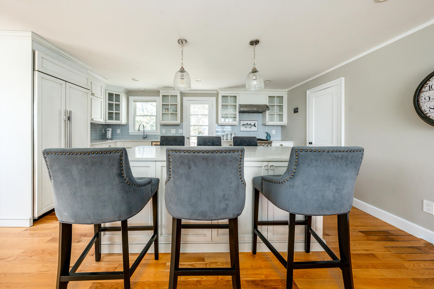 157 Brownell Road Eastham, MA 02642 - Photo 13 of 45 a living room with stainless steel appliances granite countertop furniture a fireplace a rug and a window