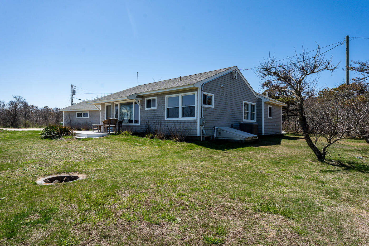 157 Brownell Road Eastham, MA 02642 - Photo 4 of 45 a front view of a house with garden